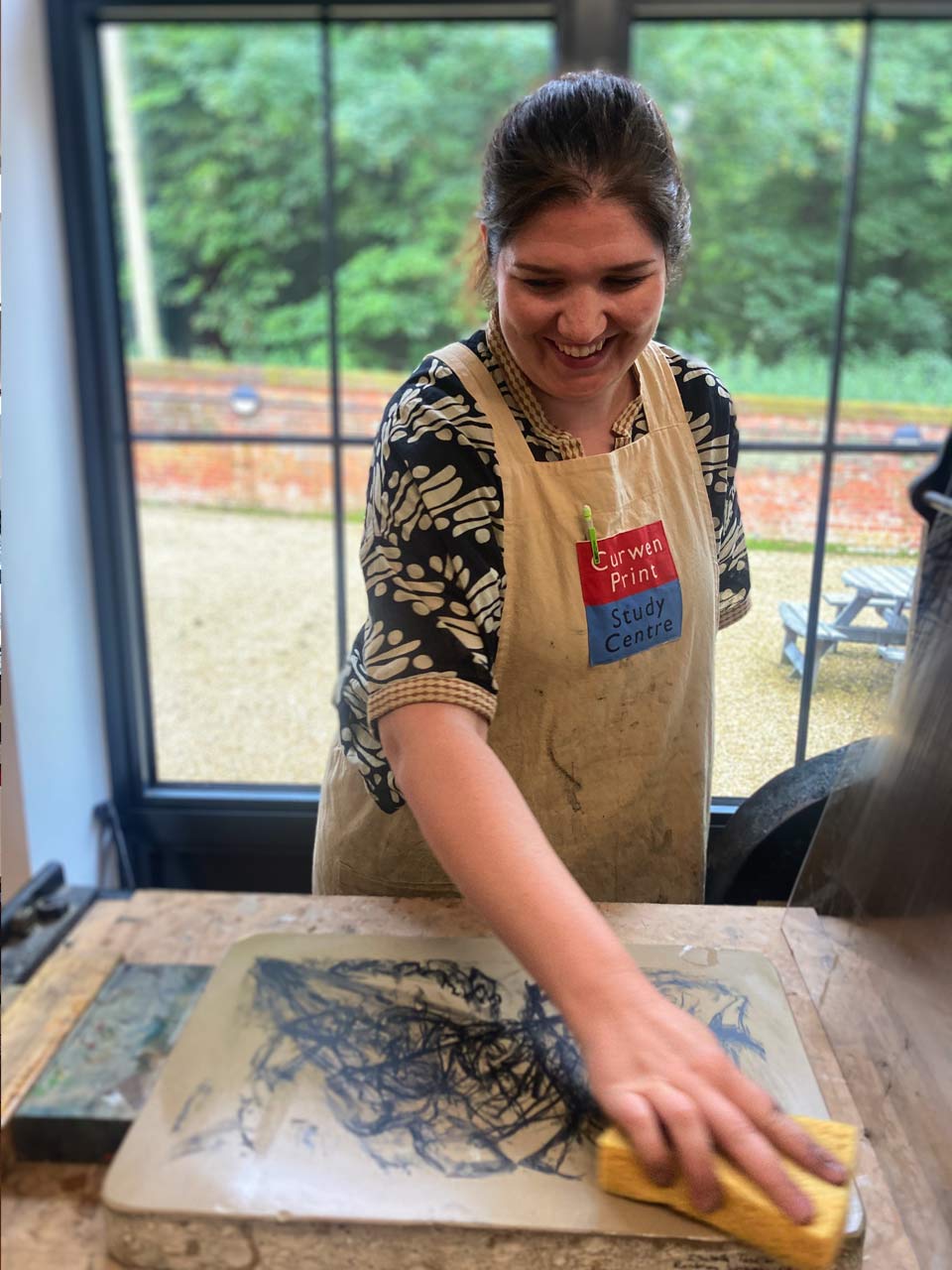 Picture of someone on a printmaking course